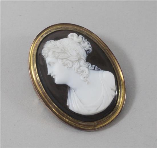 A mounted hardstone oval cameo, carved with the bust of a lady to dexter, 42mm.